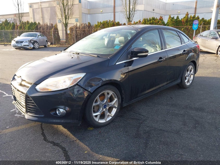 1FAHP3H23CL388243 2012 FORD FOCUS photo no. 2