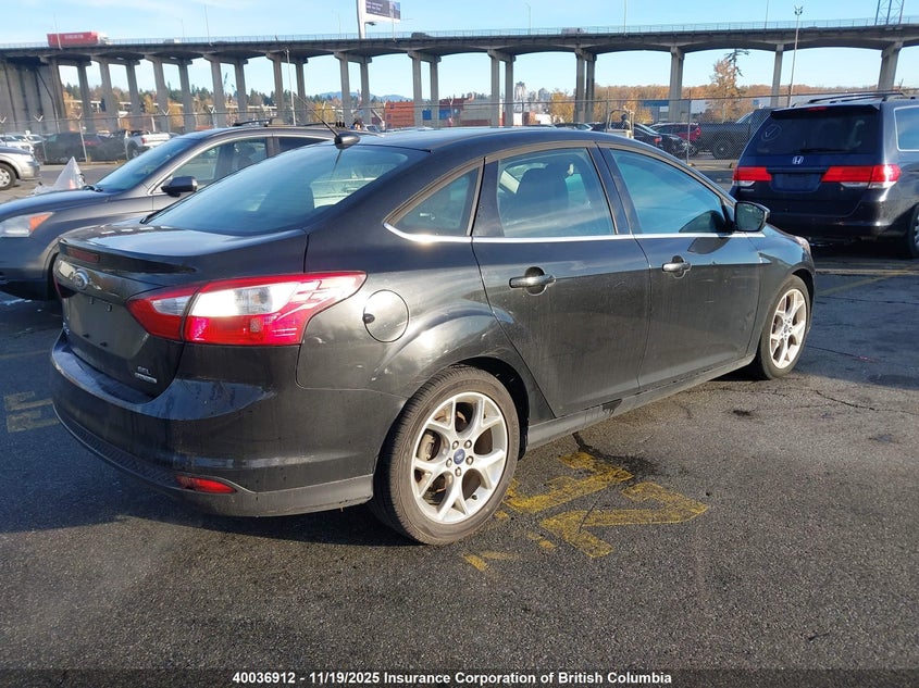1FAHP3H23CL388243 2012 FORD FOCUS photo no. 4