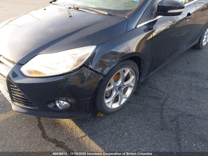 1FAHP3H23CL388243 2012 FORD FOCUS photo no. 6