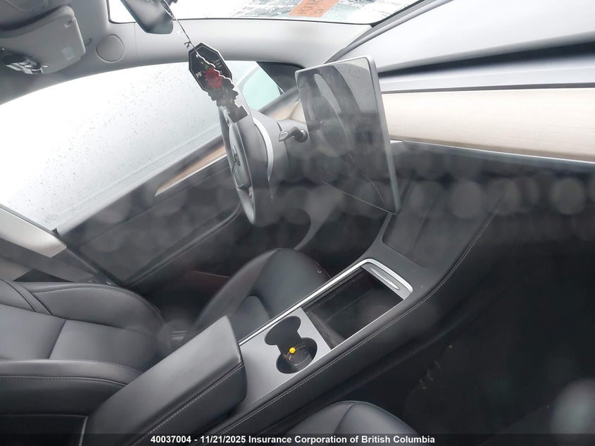 2023 Tesla Model Y VIN: LRWYGDFD1PC930995 Lot: 40037004