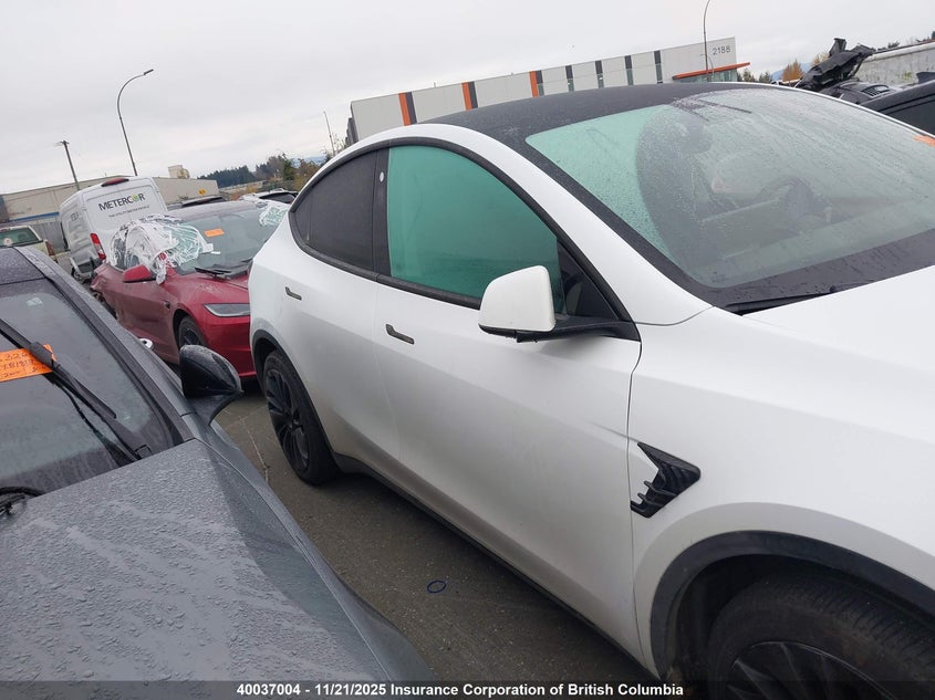2023 Tesla Model Y VIN: LRWYGDFD1PC930995 Lot: 40037004