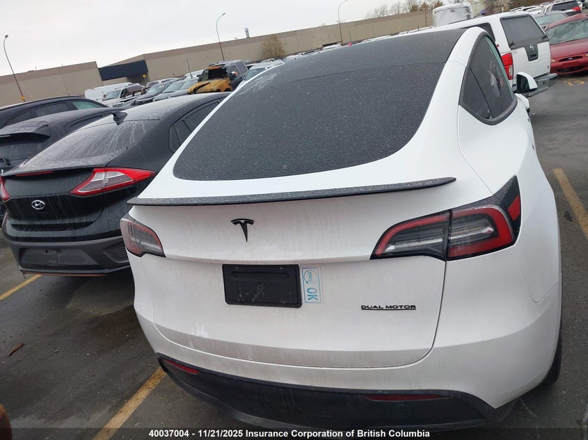 2023 Tesla Model Y VIN: LRWYGDFD1PC930995 Lot: 40037004