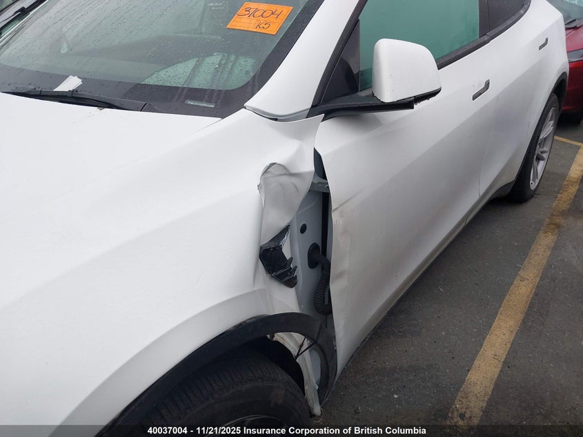 2023 Tesla Model Y VIN: LRWYGDFD1PC930995 Lot: 40037004