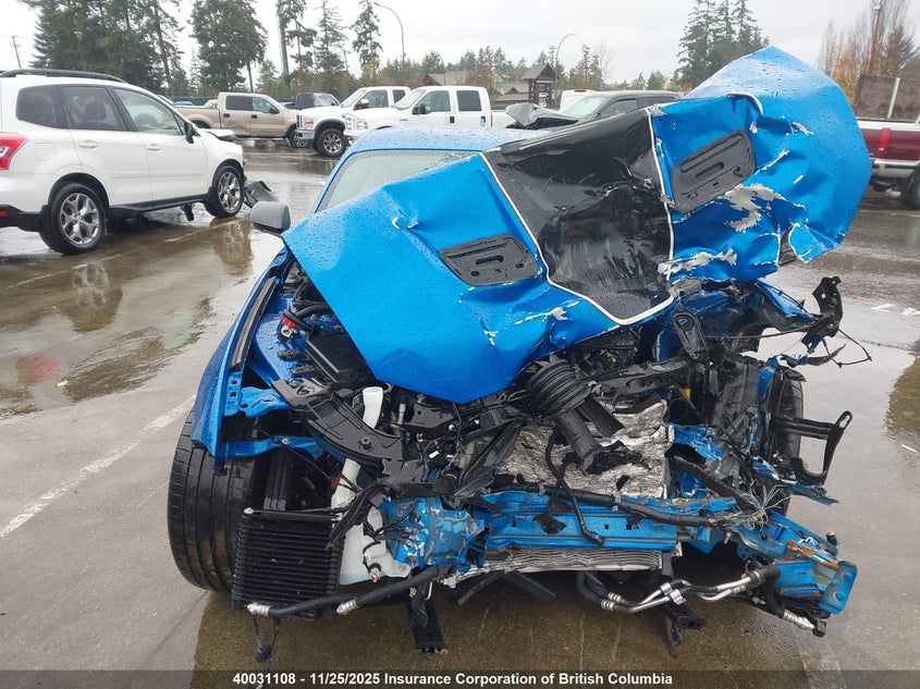 2021 Ford Mustang Mach I VIN: 1FA6P8R0XM5552692 Lot: 40031108