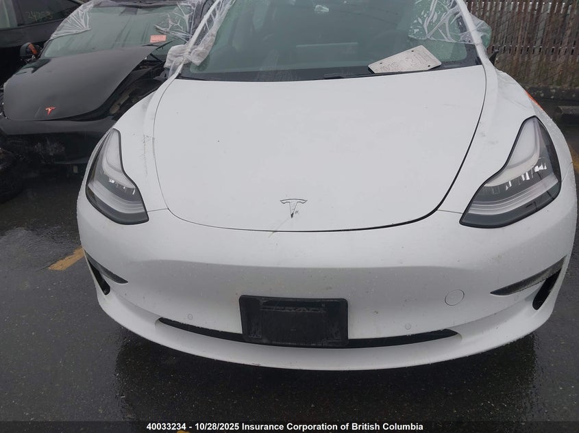 2021 Tesla Model 3 VIN: 5YJ3E1EA5MF843351 Lot: 40033234