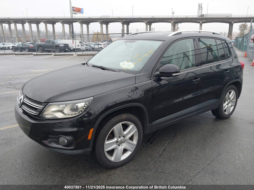 WVGJV3AX8EW551392 2014 VOLKSWAGEN TIGUAN photo no. 2