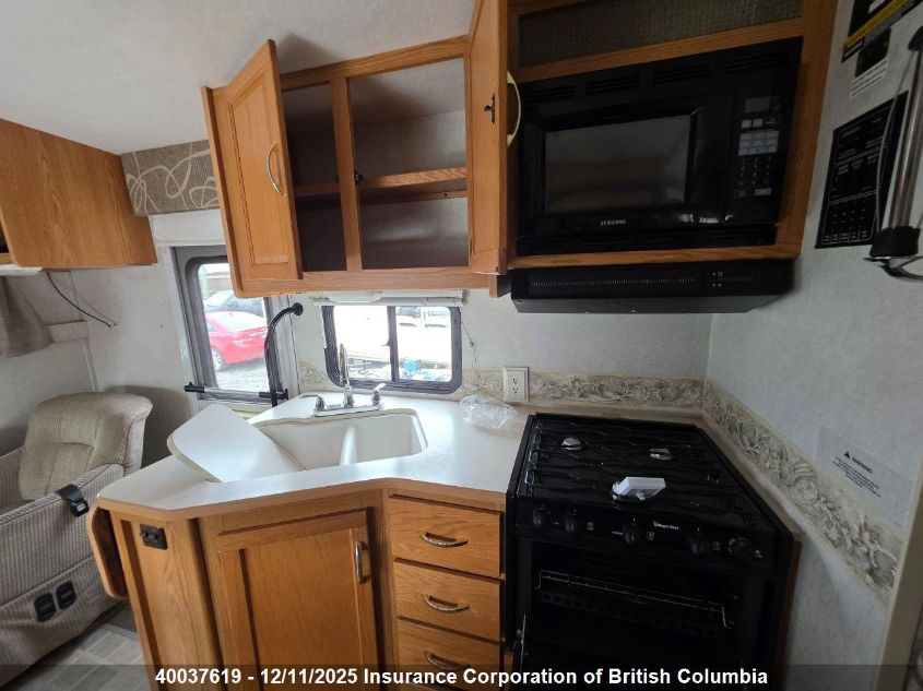 2005 Ford Econoline E450 Super Duty Cutwy Van VIN: 1FDXE45S45HA39793 Lot: 40037619