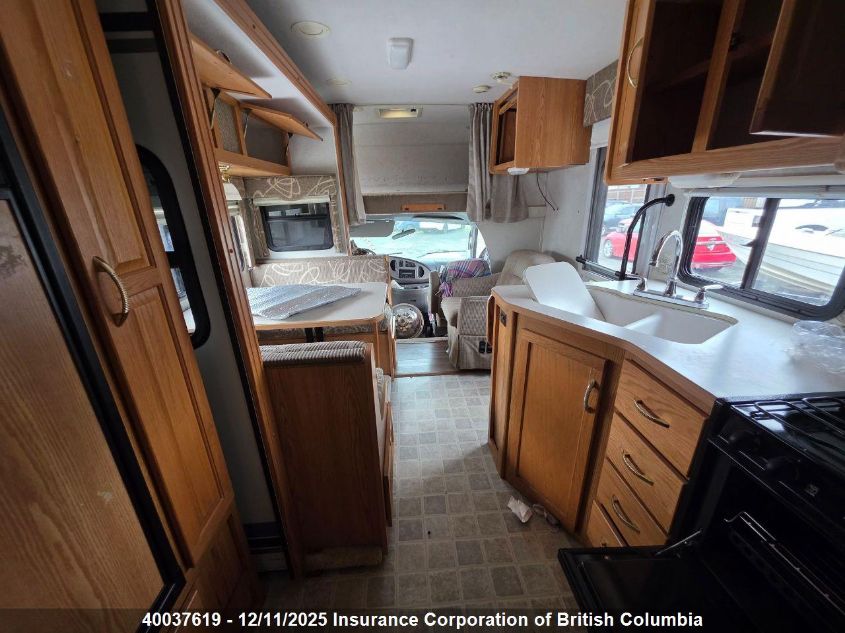 2005 Ford Econoline E450 Super Duty Cutwy Van VIN: 1FDXE45S45HA39793 Lot: 40037619