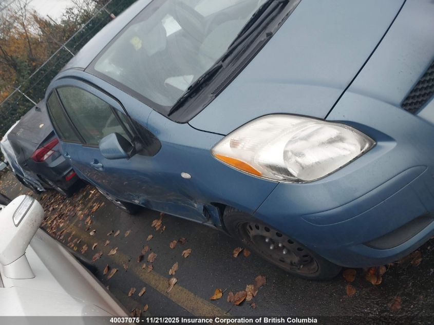 2009 Toyota Yaris VIN: JTDKT923495250711 Lot: 40037075