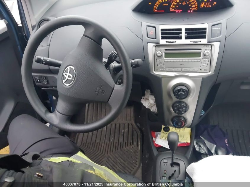 2009 Toyota Yaris VIN: JTDKT923495250711 Lot: 40037075