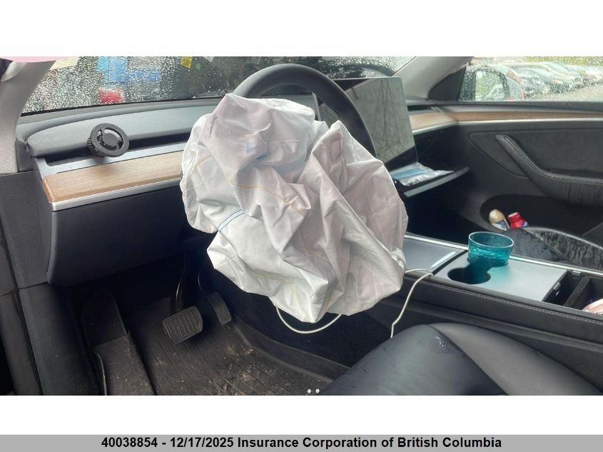 2023 Tesla Model Y VIN: 7SAYGAEE3PF765520 Lot: 40038854