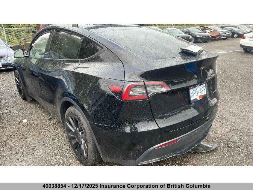 2023 Tesla Model Y VIN: 7SAYGAEE3PF765520 Lot: 40038854