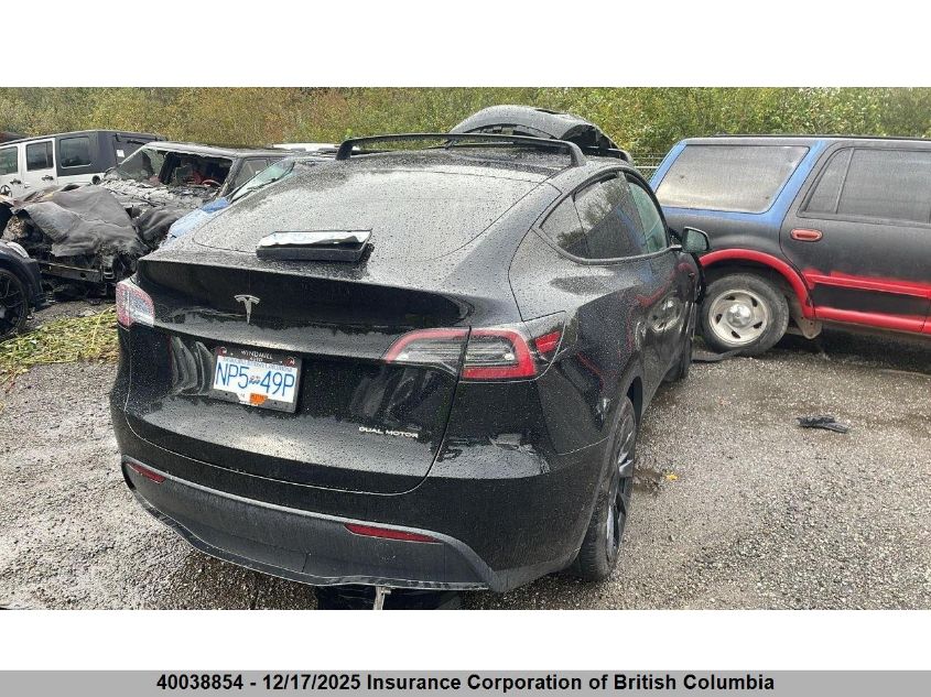 2023 Tesla Model Y VIN: 7SAYGAEE3PF765520 Lot: 40038854