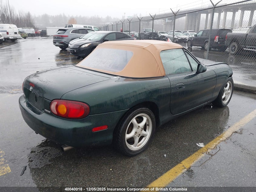 JM1NB3533X0109339 1999 MAZDA MX-5 photo no. 4