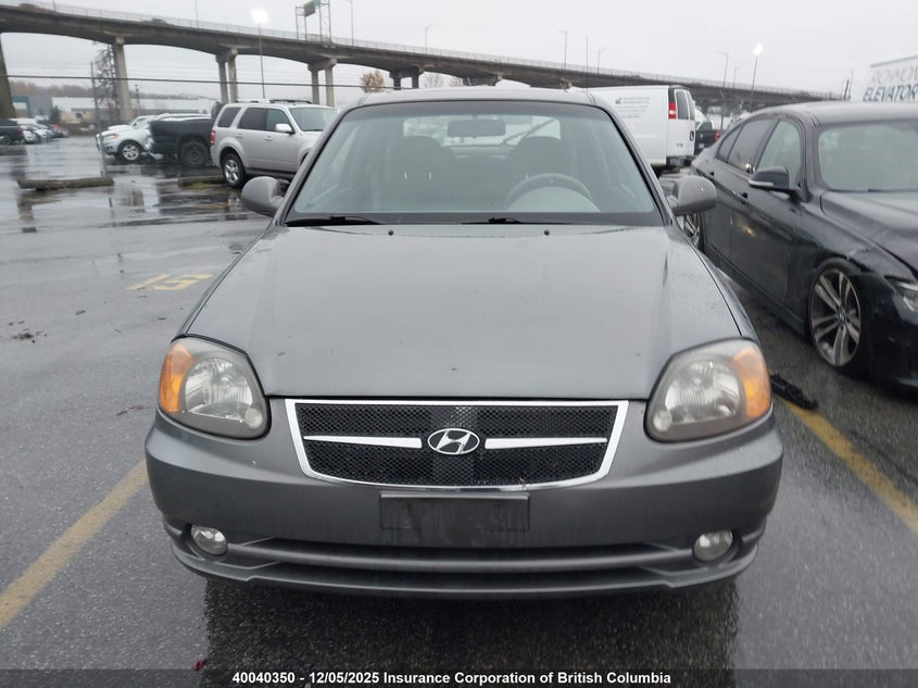 KMHCG35C44U291352 2004 HYUNDAI ACCENT photo no. 11