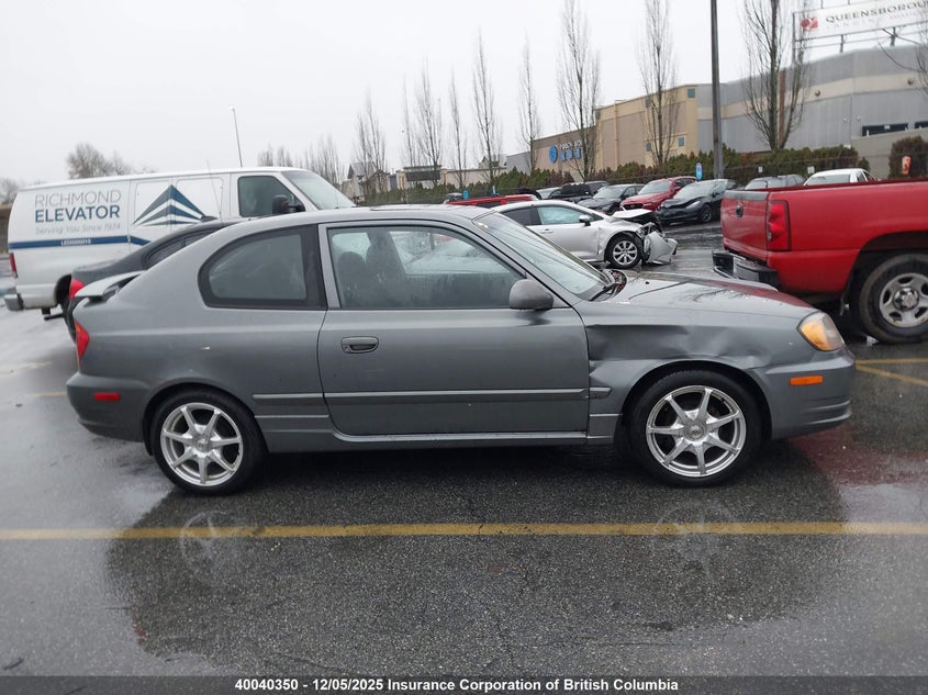 KMHCG35C44U291352 2004 HYUNDAI ACCENT photo no. 12