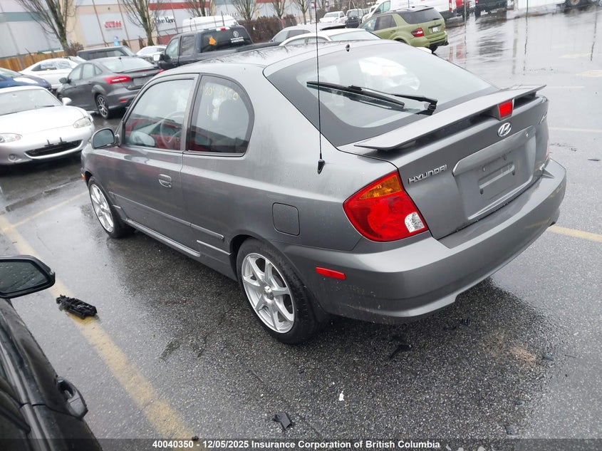 KMHCG35C44U291352 2004 HYUNDAI ACCENT photo no. 3