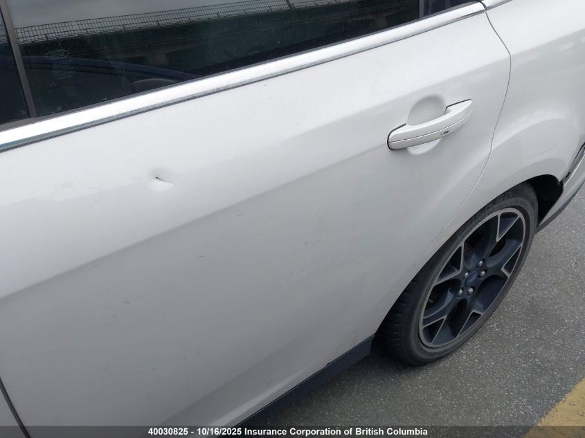 2012 Ford Focus Titanium VIN: 1FAHP3J21CL345210 Lot: 40030825