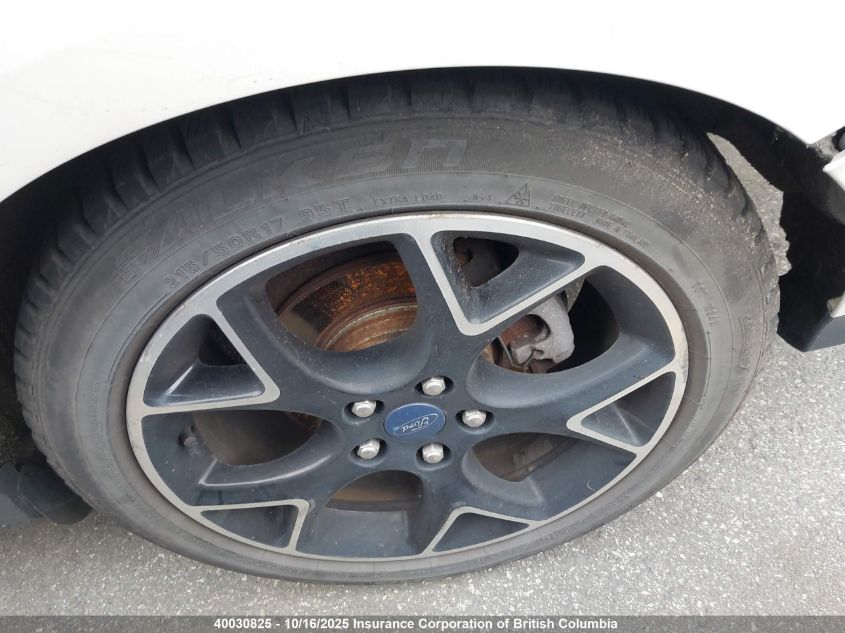 2012 Ford Focus Titanium VIN: 1FAHP3J21CL345210 Lot: 40030825