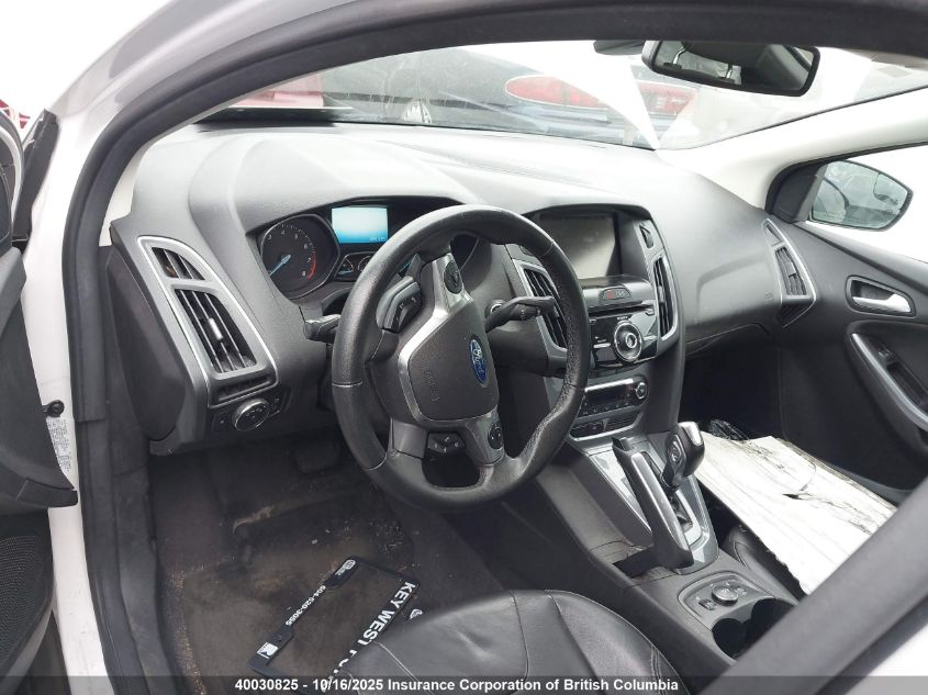 2012 Ford Focus Titanium VIN: 1FAHP3J21CL345210 Lot: 40030825
