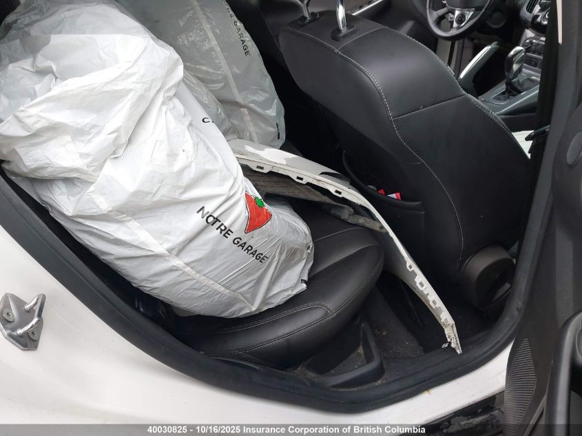 2012 Ford Focus Titanium VIN: 1FAHP3J21CL345210 Lot: 40030825