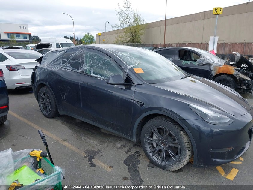 2025 Tesla Model Y VIN: 7SAYGAEE7SF296280 Lot: 40062664