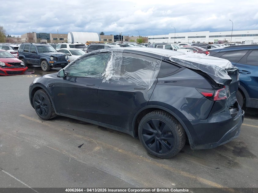 2025 Tesla Model Y VIN: 7SAYGAEE7SF296280 Lot: 40062664
