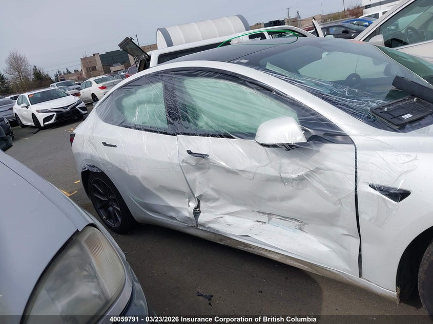 2022 Tesla Model 3 VIN: 5YJ3E1EB0NF275939 Lot: 40059791