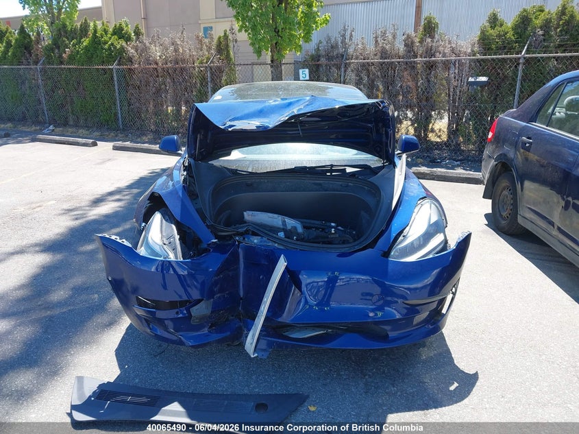 2022 Tesla Model 3 VIN: 5YJ3E1EC0NF266263 Lot: 40065490