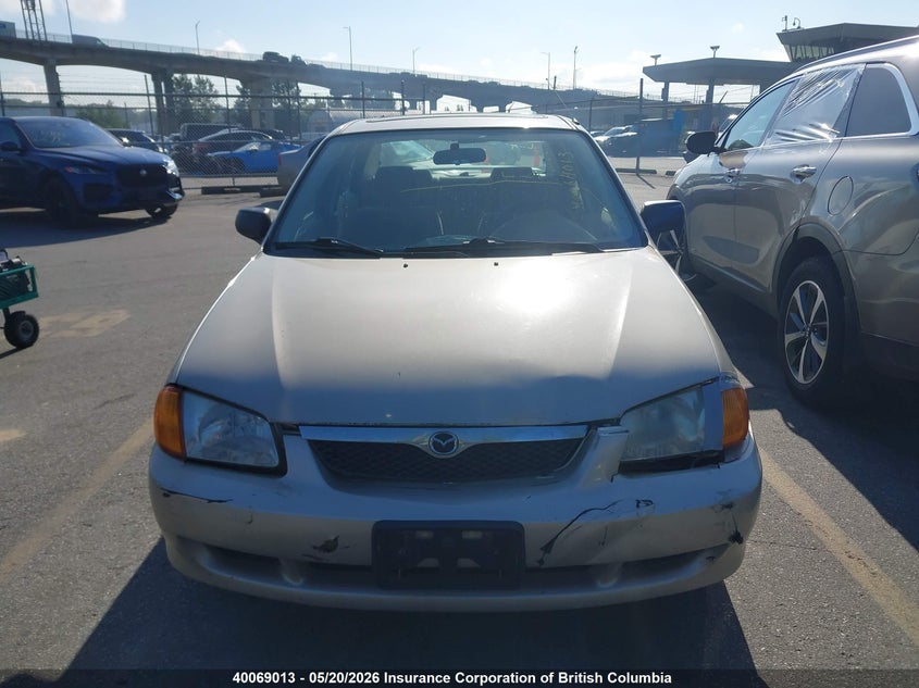 2000 Mazda Protege Es VIN: JM1BJ2219Y0243891 Lot: 40069013