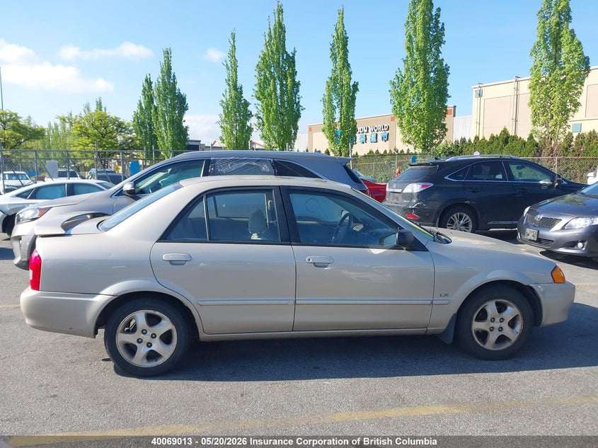 2000 Mazda Protege Es VIN: JM1BJ2219Y0243891 Lot: 40069013