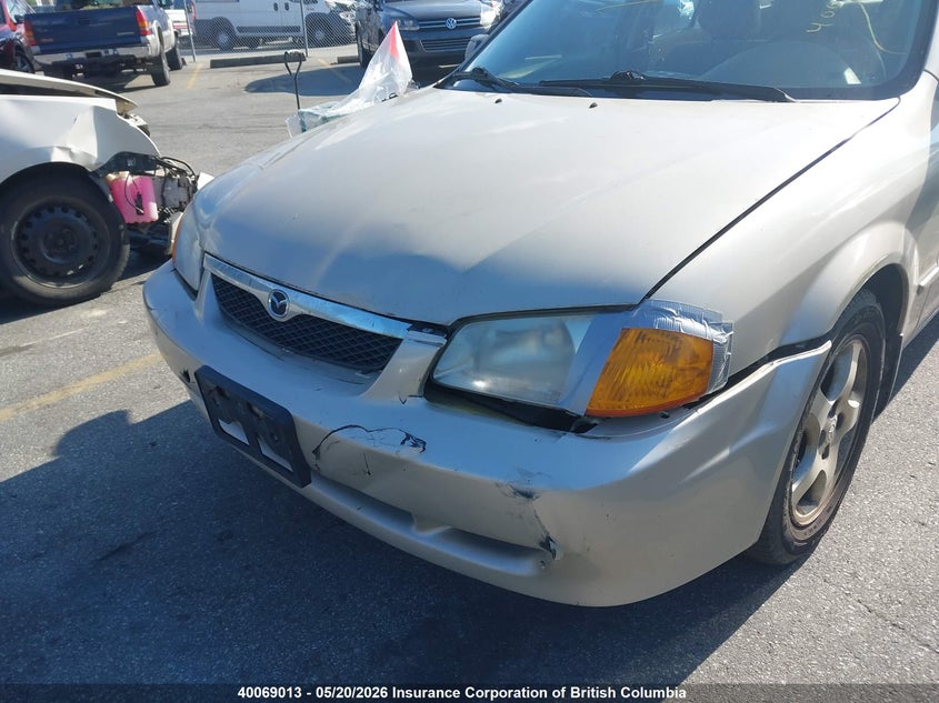 2000 Mazda Protege Es VIN: JM1BJ2219Y0243891 Lot: 40069013