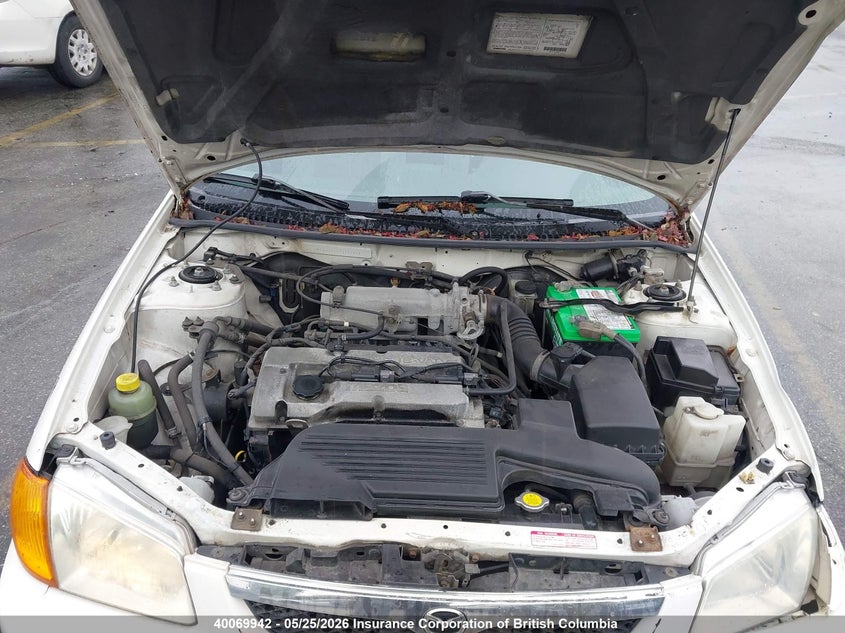 2000 Mazda Protege Dx/Lx VIN: JM1BJ2225Y0257974 Lot: 40069942