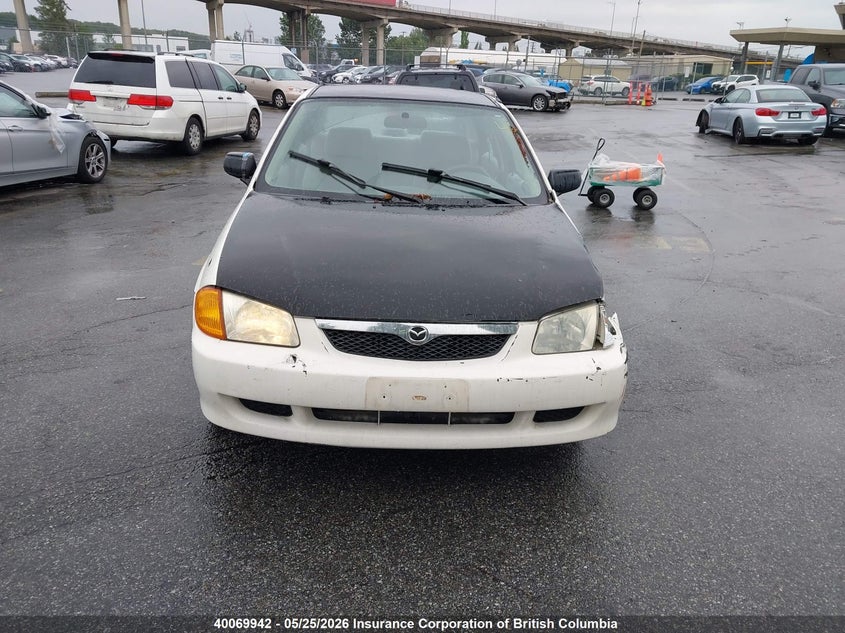 2000 Mazda Protege Dx/Lx VIN: JM1BJ2225Y0257974 Lot: 40069942
