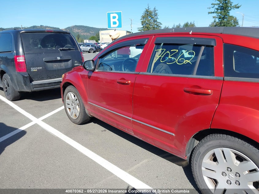 2010 Dodge Caliber Sxt VIN: 1B3CB4HA0AD597027 Lot: 40070362