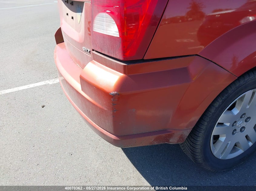2010 Dodge Caliber Sxt VIN: 1B3CB4HA0AD597027 Lot: 40070362