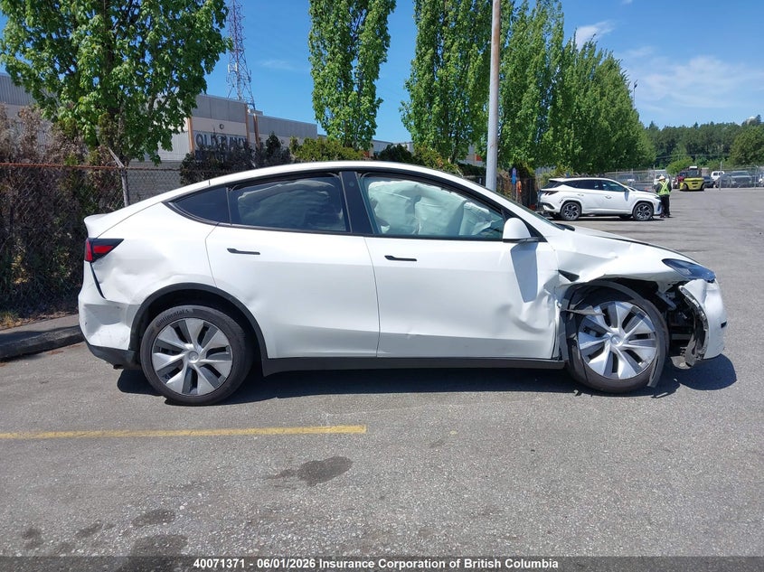 2023 Tesla Model Y VIN: 7SAYGDEE6PF597051 Lot: 40071371