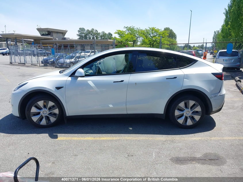 2023 Tesla Model Y VIN: 7SAYGDEE6PF597051 Lot: 40071371