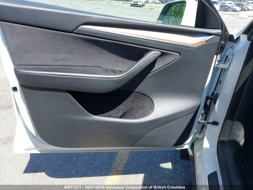 2023 Tesla Model Y VIN: 7SAYGDEE6PF597051 Lot: 40071371