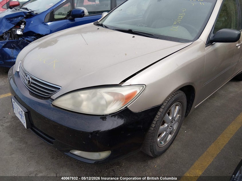 2002 Toyota Camry, Rear, IAAI, VIN JTDBE30K920012857 — photo 2