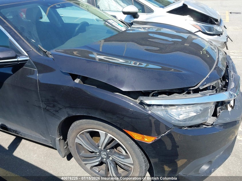 2017 Honda Civic Touring VIN: 2HGFC1F97HH101851 Lot: 40076225