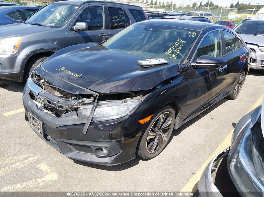 2017 Honda Civic Touring VIN: 2HGFC1F97HH101851 Lot: 40076225