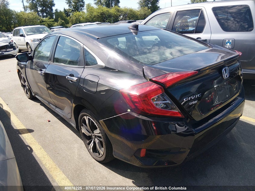 2017 Honda Civic Touring VIN: 2HGFC1F97HH101851 Lot: 40076225