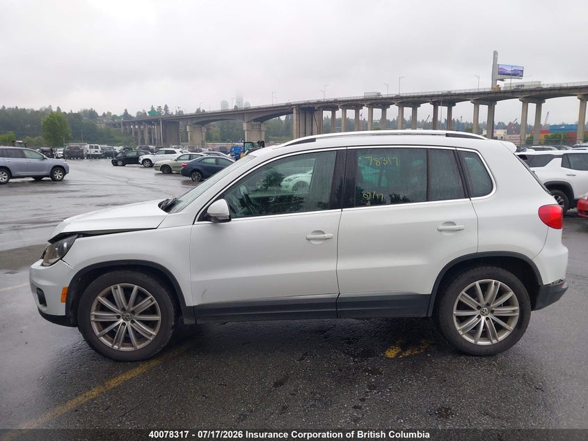 2014 Volkswagen Tiguan S/Se/Sel/R-Line VIN: WVGJV3AX4EW572627 Lot: 40078317