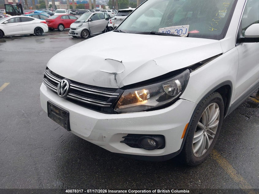 2014 Volkswagen Tiguan S/Se/Sel/R-Line VIN: WVGJV3AX4EW572627 Lot: 40078317