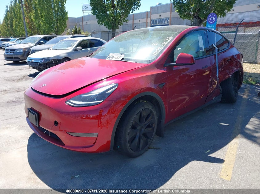 2025 Tesla Model Y, Левый зад, IAAI, VIN 7SAYGDEEXSF241193 — фото 2