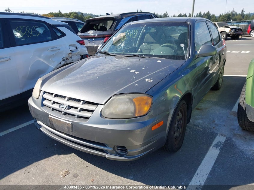 2004 Hyundai Accent, Left Side, IAAI, VIN KMHCG35C84U317208 — photo 2