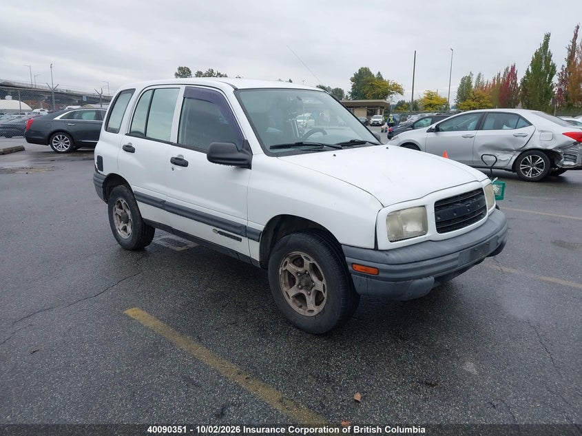 1999 Chevrolet Tracker, Right Front, IAAI, VIN 2CNBJ13C7X6927110