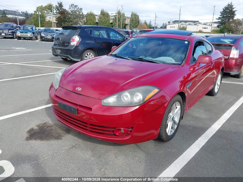 2007 Hyundai Tiburon Gs, Interior Fire, IAAI, VIN KMHHM65D27U247542 — photo 2
