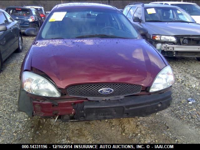 2005 Ford Taurus Se VIN: 1FAFP53U15A180310 Lot: 14331196